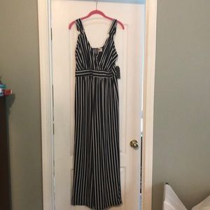 Romper Size large L.  NWT. Wrapper brand.